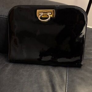 Salvatore Ferragamo Black Patent Leather Clutch missing shoulder chain.